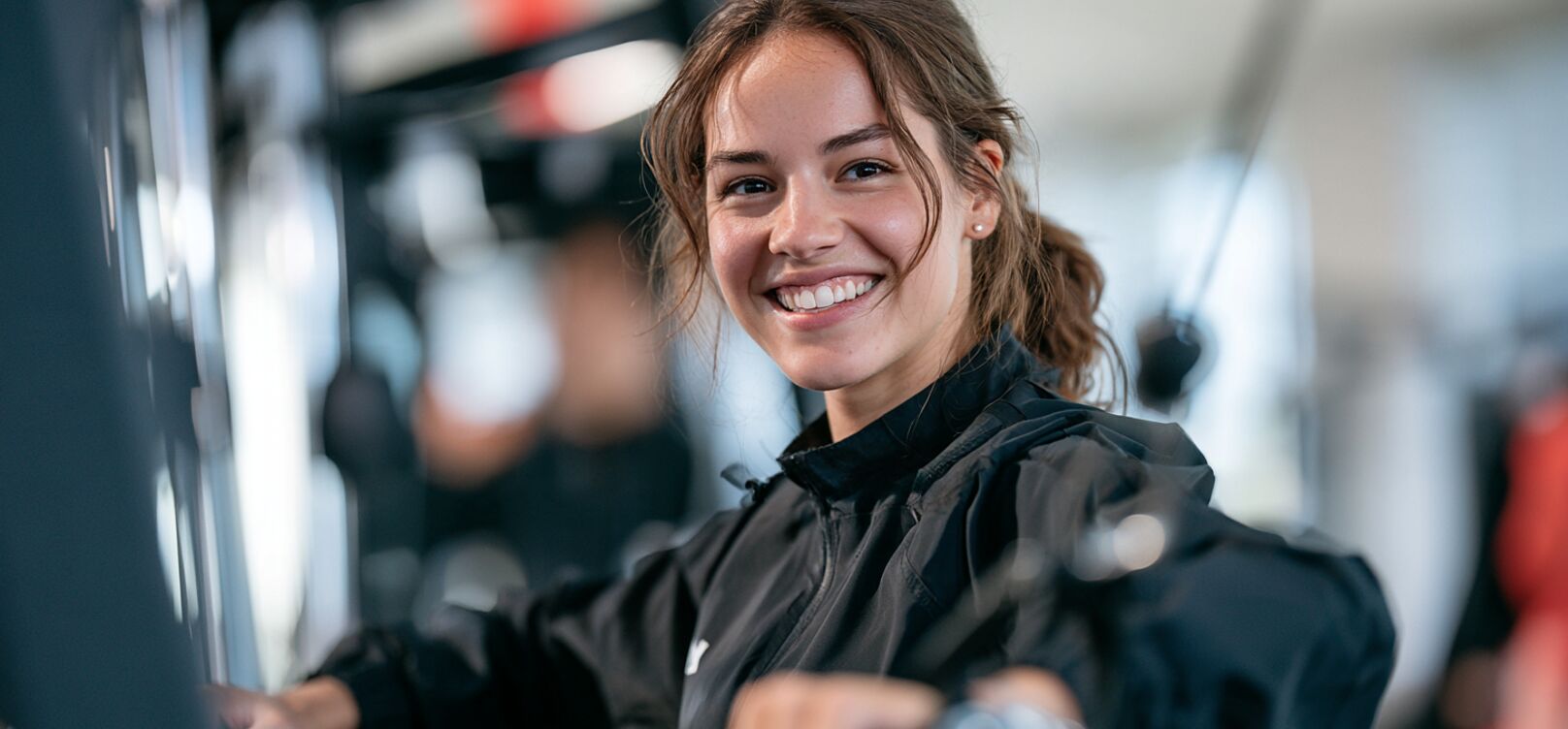 Gym member smiling between sets